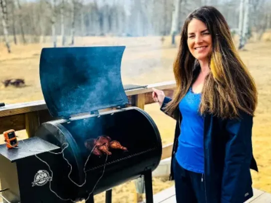 Jeri Walker of Winding Creek Ranch fires up the grill in Alberta.