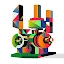 An abstract, colorful geometric sculpture-like illustration composed of various 3D shapes and patterns.