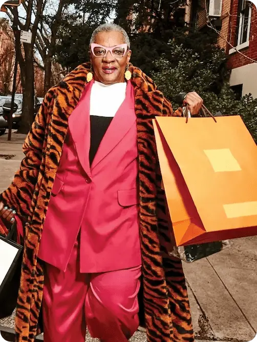 person holding many shopping bags
