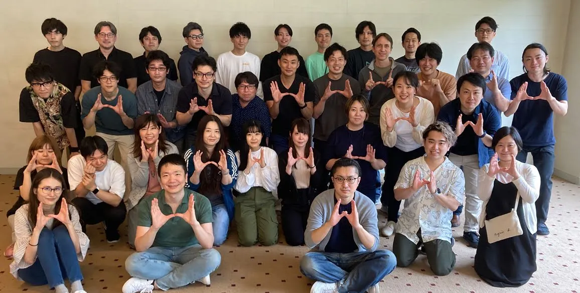 The unerry team pose together indoors for the camera.