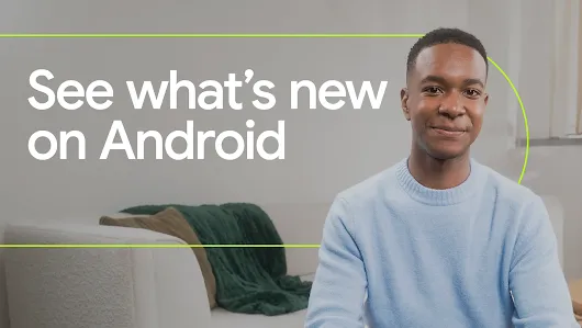 Man sitting in front of a white couch with a green blanked draped over it with the words "See what's new on Android"