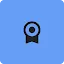 A minimalist black icon of a circular award ribbon or seal centered on a light blue square background with rounded corners. The icon symbolizes Google Public Sector's CMMC Level 2 certification and its commitment to meeting stringent national security requirements.