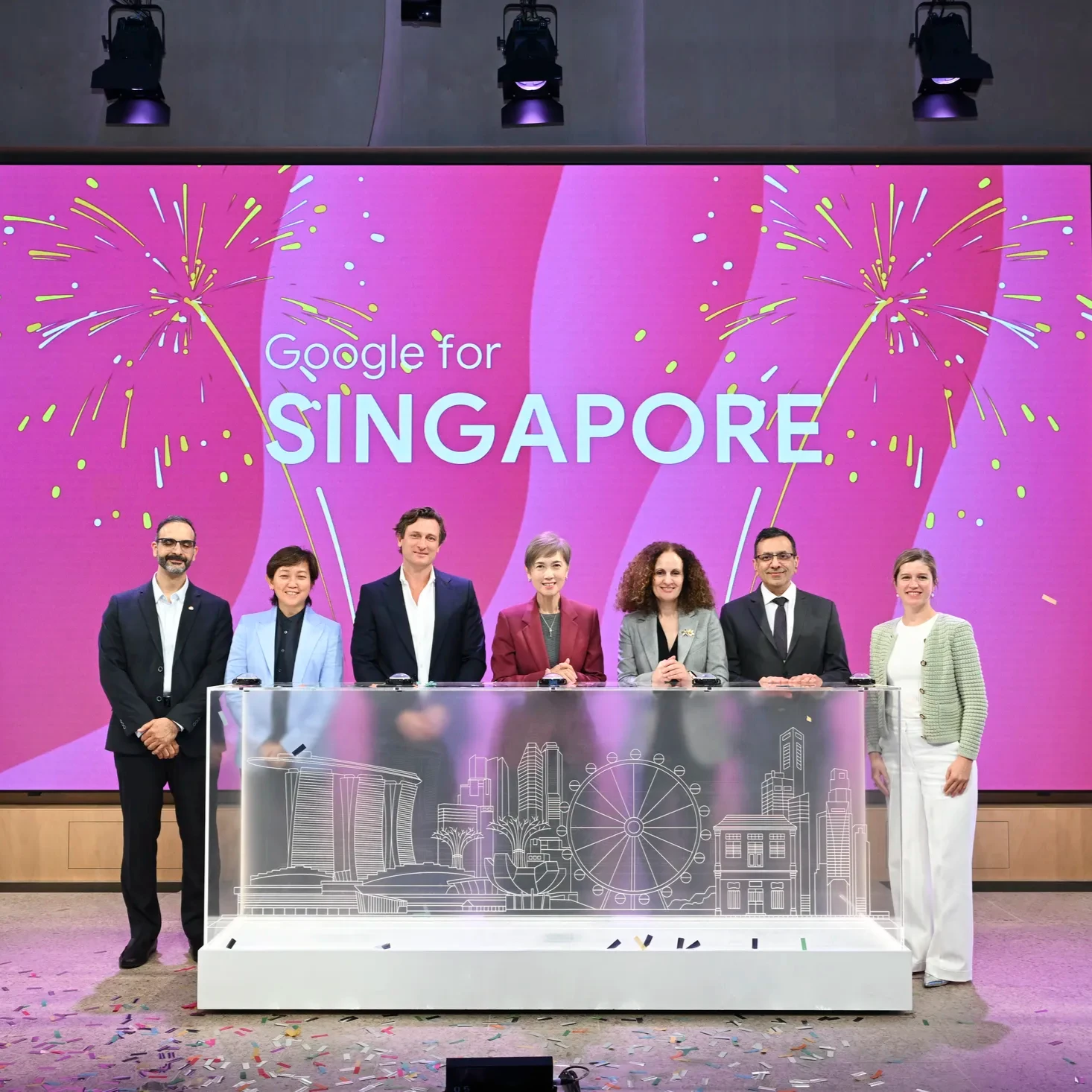 Image of the team on stage