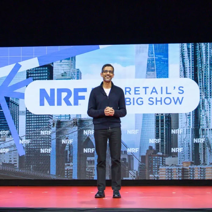 A photograph of Sundar Pichai, Google's CEO, on stage at the National Retail Federation Retail's Big Show