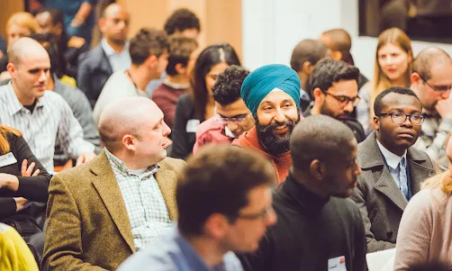 A man and woman smiling