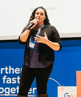 a women with holding a mic 