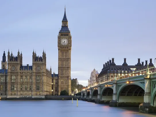 Photograph of Big Ben lock tower and bridge in London.