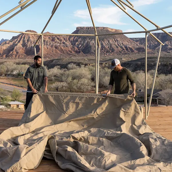 People building a tent