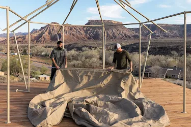 People building a tent