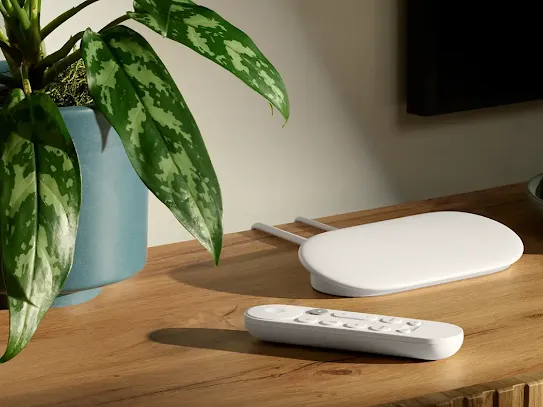 Image of a Google TV Streamer (4K) placed on a TV stand