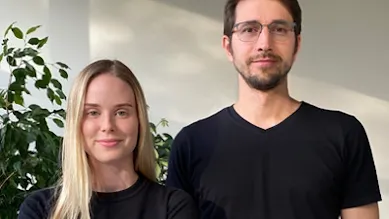 A man and a woman looking at camera.
