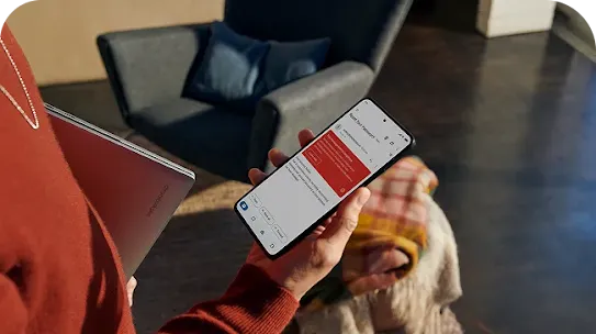 Woman receiving message to reset password on her device