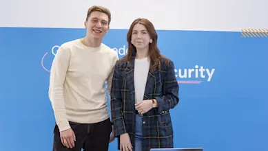 A man and woman posing for picture.