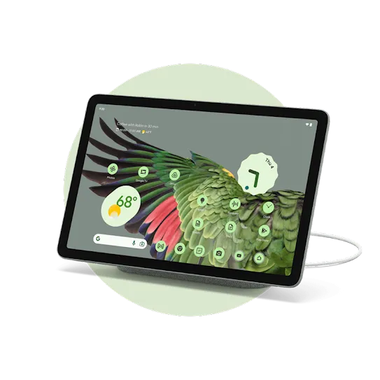 A tablet plugged in on a charging dock.