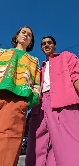 Two friends outdoors shown in a story format on a smartphone screen