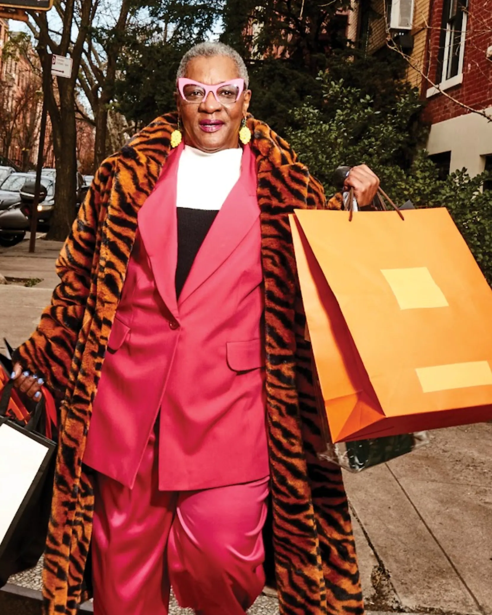 person holding many shopping bags