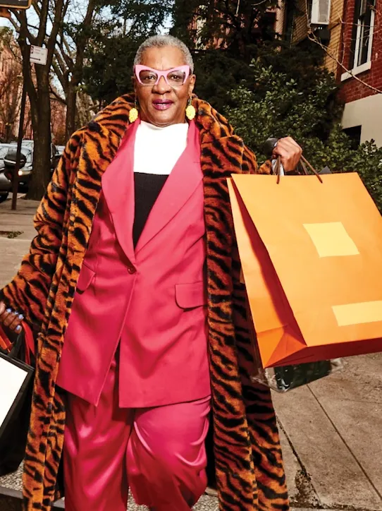 person holding many shopping bags