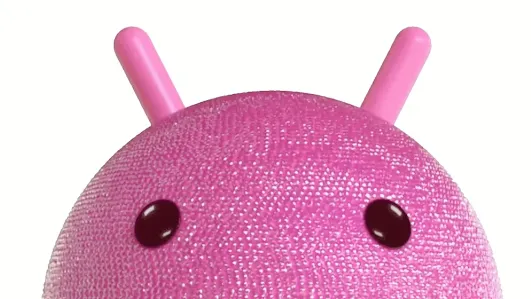 The Android bot is covered in pink rhinestones twirls and winks.