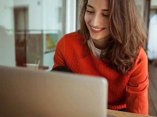 Woman looking at computer.