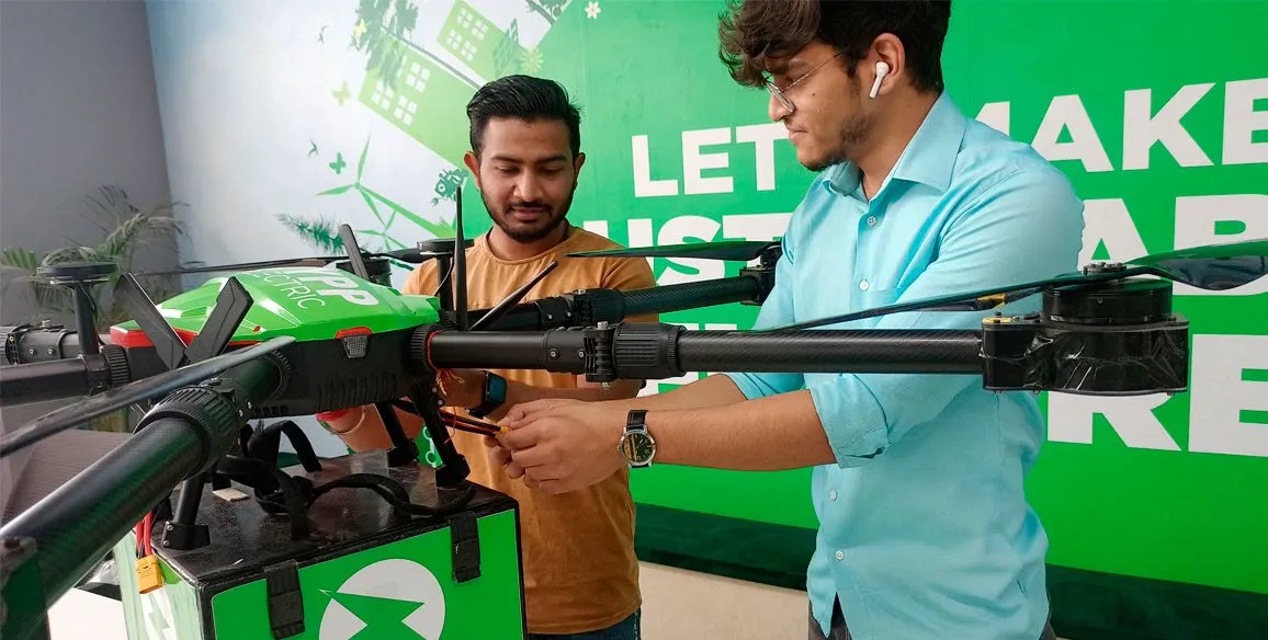 Zypp Electric team members setting up some electric device.