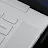 Close-up of the Googlebook keyboard corner showing the power button, volume keys, backspace key, and speakers.