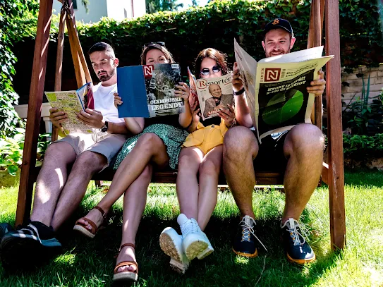 FatChilli employees reading newspapers.