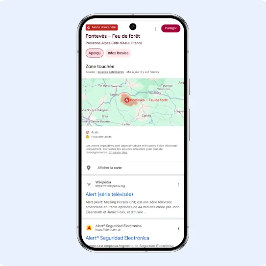 Interface d'un smartphone qui affiche une alerte Google concernant les incendies dans la région du Grand Los Angeles. Le tableau de bord détaille la qualité de l'air en Californie d'après airnow.gov et la NOAA, avec une carte interactive de la région, un indice de l'IQA avec une échelle de couleurs et des informations météorologiques officielles du National Weather Service accompagnées d'un avis de vent fort.