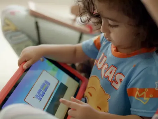 Vivek's daughter using one of their education apps.