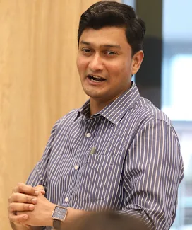 A man holding his hands.