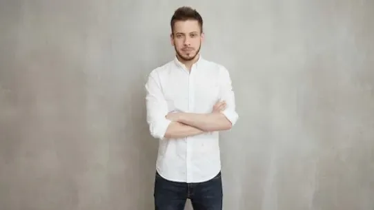 Javier Cuevas, the male founder of Kelify posing for a headshot