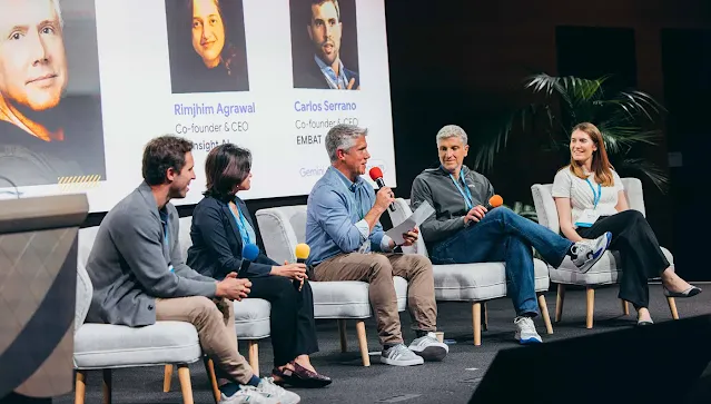 Couple of men and women discussing cybersecurity.