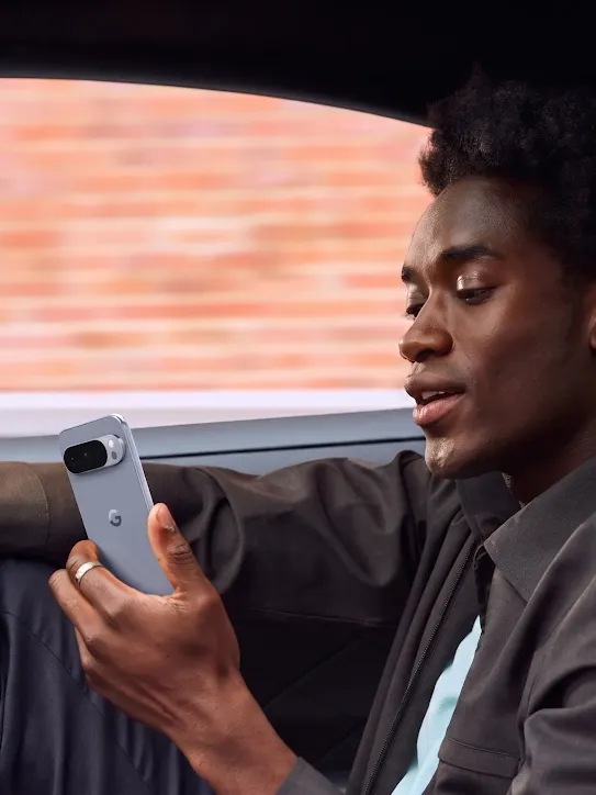 Image of a man using his Android-powered device