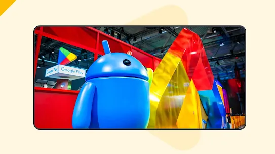 A photographic rendering of Google Play's booth at Gamescom featuring a large blue Android robot statue. In the background, there are bright red structure walls, a prominent Google Play logo, and the text "Google Play".