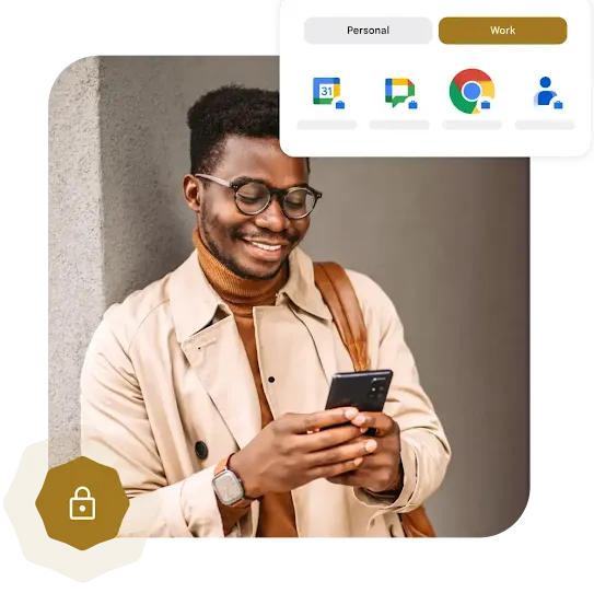 A person, leaning against a concrete wall, wearing a brown turtleneck underneath a tan jacket smiles while looking at their phone.