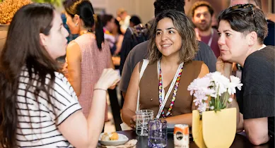 Attendees talking and networking at an event