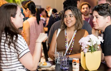 Attendees talking and networking at an event