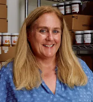 A photograph of Risa Baron, the owner of Jackie’s Jams, an artisanal jam business based in San Diego, California.