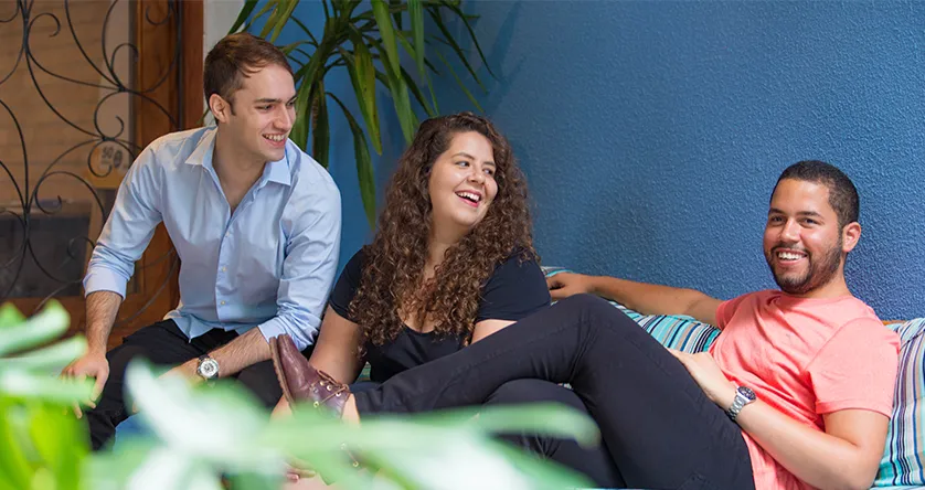 three people are laughing