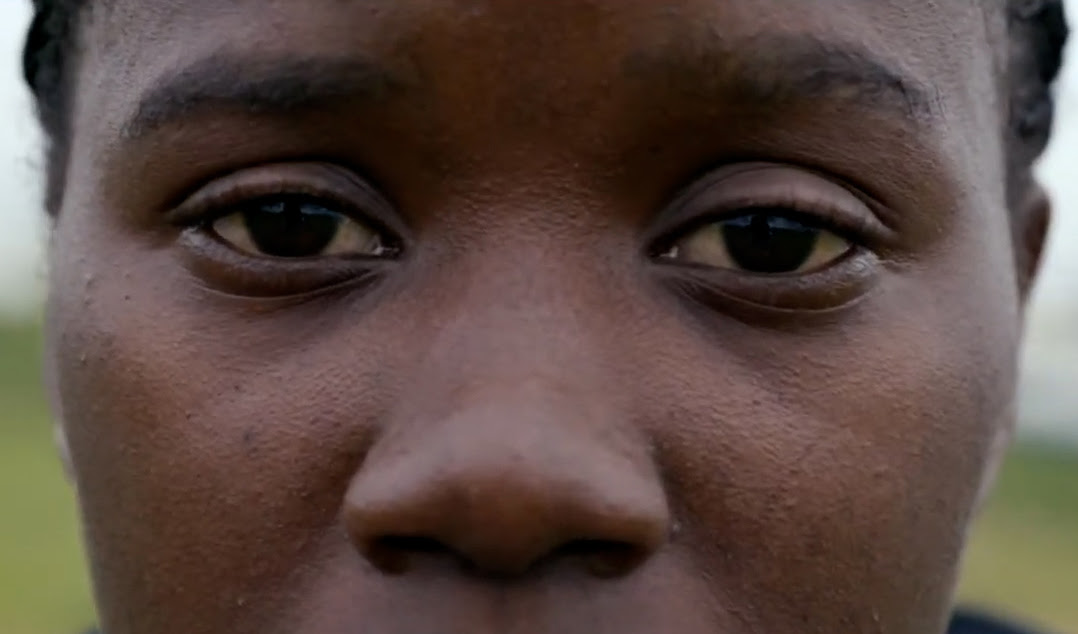 Close up image of Rita, a Congolese slam poet