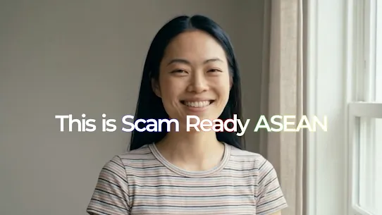 A light skin coloured lady smiling to the camera with the text, This is Scam Ready ASEAN