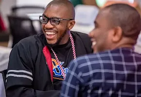 Two persons are laughing