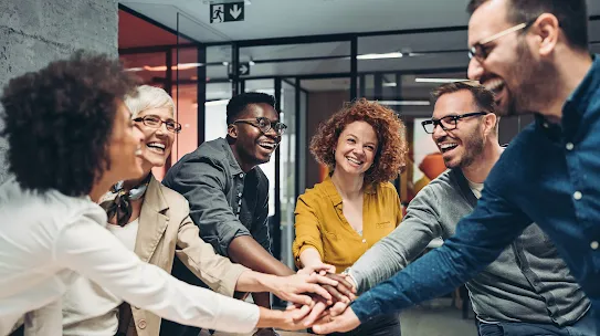 Partners standing together in a circle