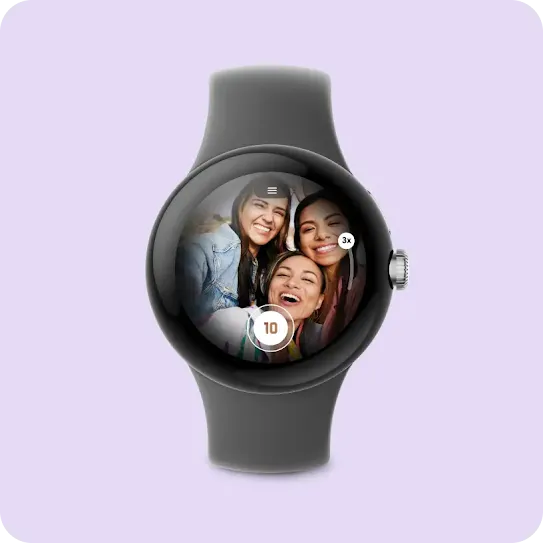 A smartwatch displaying an image of three smiling friends on the screen with a camera button and zoom control.