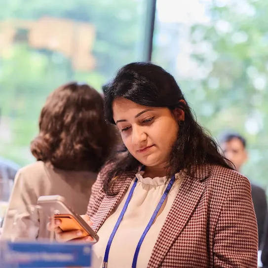 A woman using her phone.