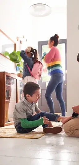 Family scene shown inside a social media post on a smartphone screen