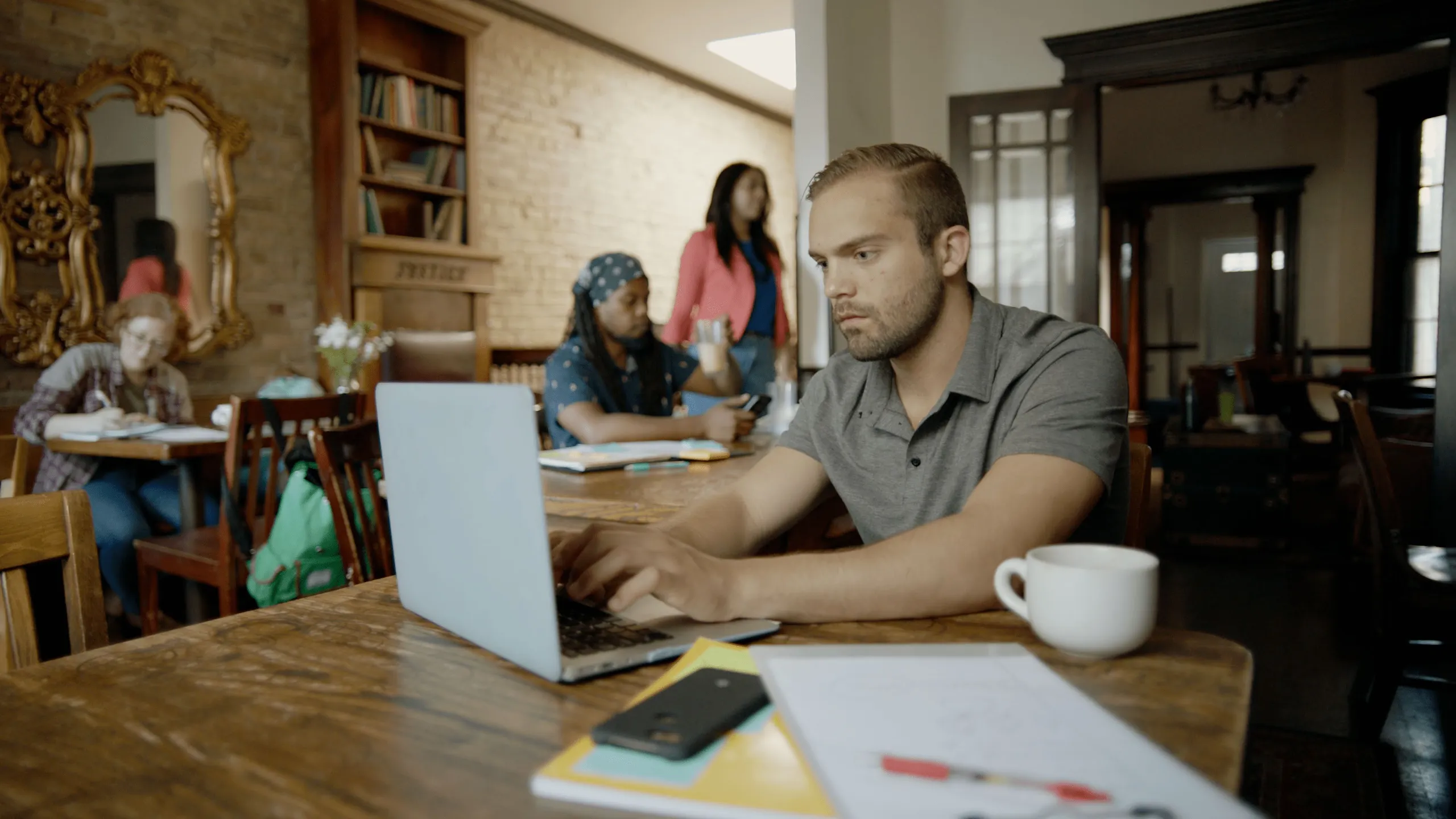 man types on computer