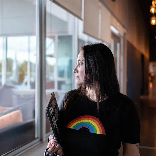 Googler Kareen Elizabeth Araneda walks down hallway at Quilicura Chile data center