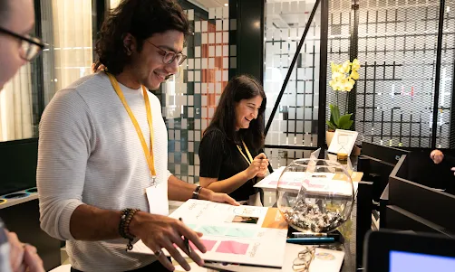 Two persons are writing