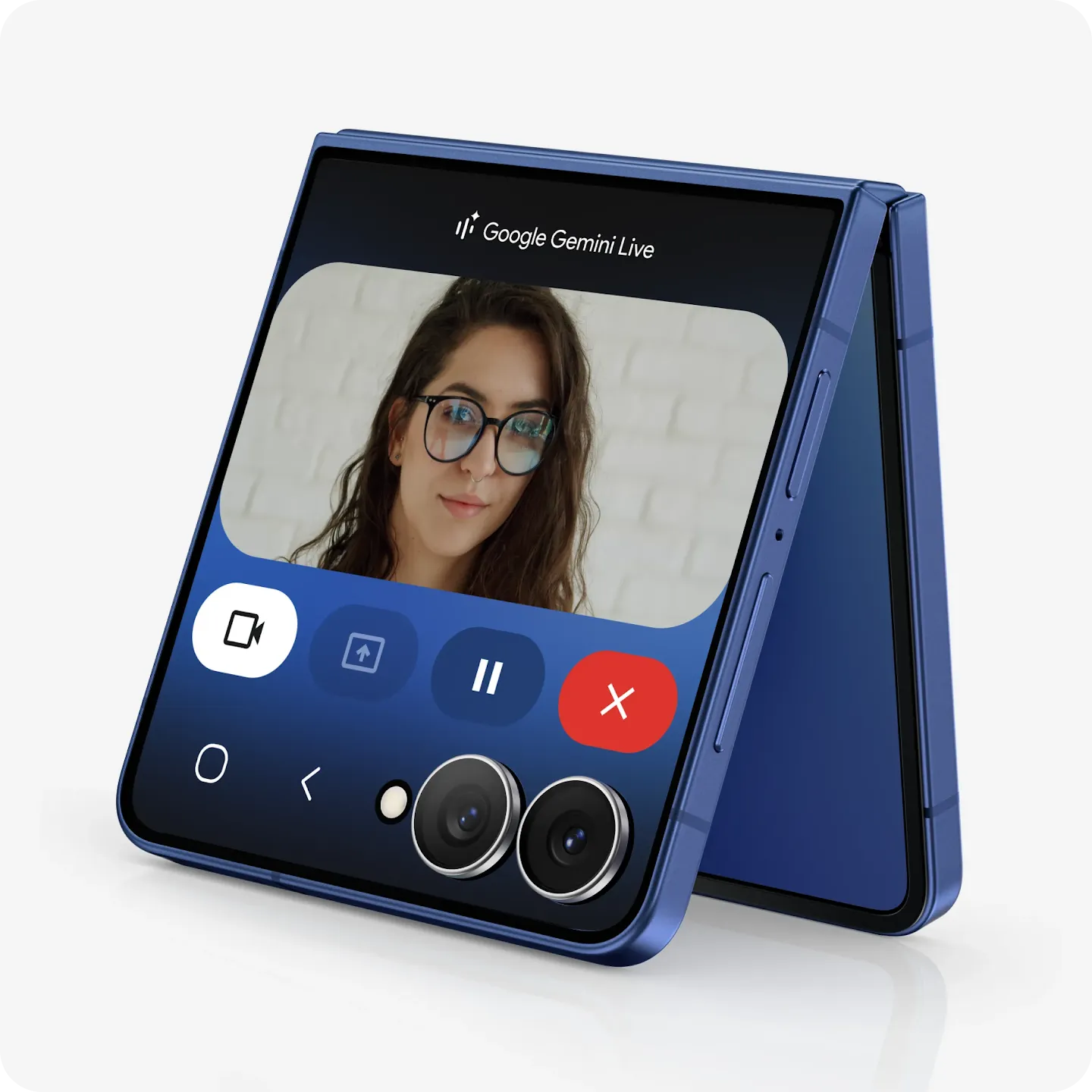 Galaxy Z Flip7 screen shows a person with long dark hair in front of a white brick wall trying on different glasses as an example of how Gemini Live’s camera function works.