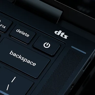 Close-up of the Googlebook keyboard corner showing the power button, volume keys, backspace key, and speakers.